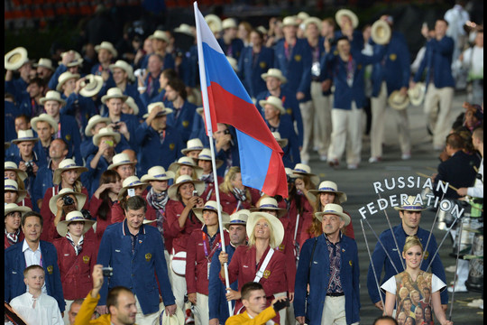 M.Šarapova Londono olimpinėse žaidynėse nešė Rusijos vėliavą.<br>AFP/Scanpix nuotr.