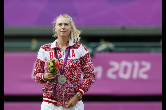 M.Šarapova Londono olimpiadoje laimėjo sidabro medalį.<br>Reuters/Scanpix nuotr.