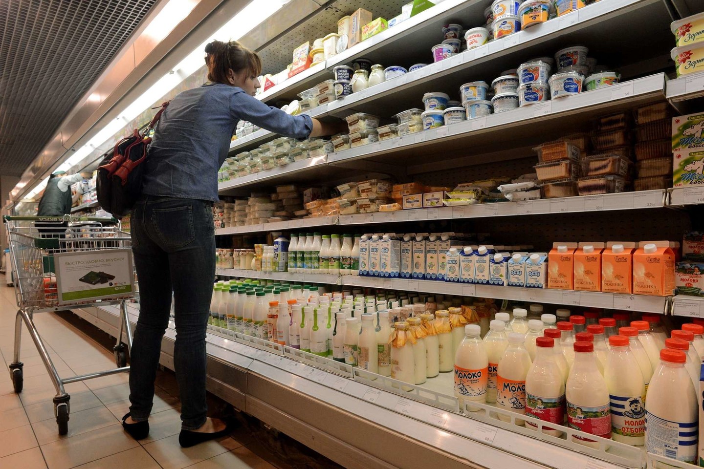 Rusijos pieno rinkos dalyviai įspėja: nutrauks tiekimą į parduotuves.<br>AFP/Scanpix nuotr.