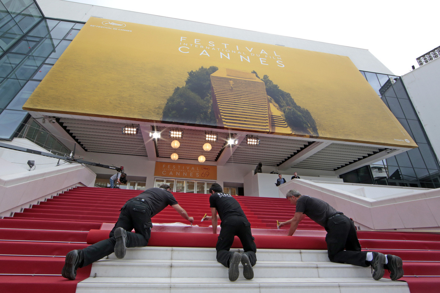 Kanai ruošiasi prestižiniam kino festivaliui.<br>AFP ir „Reuters“ („Scanpix“) nuotr.