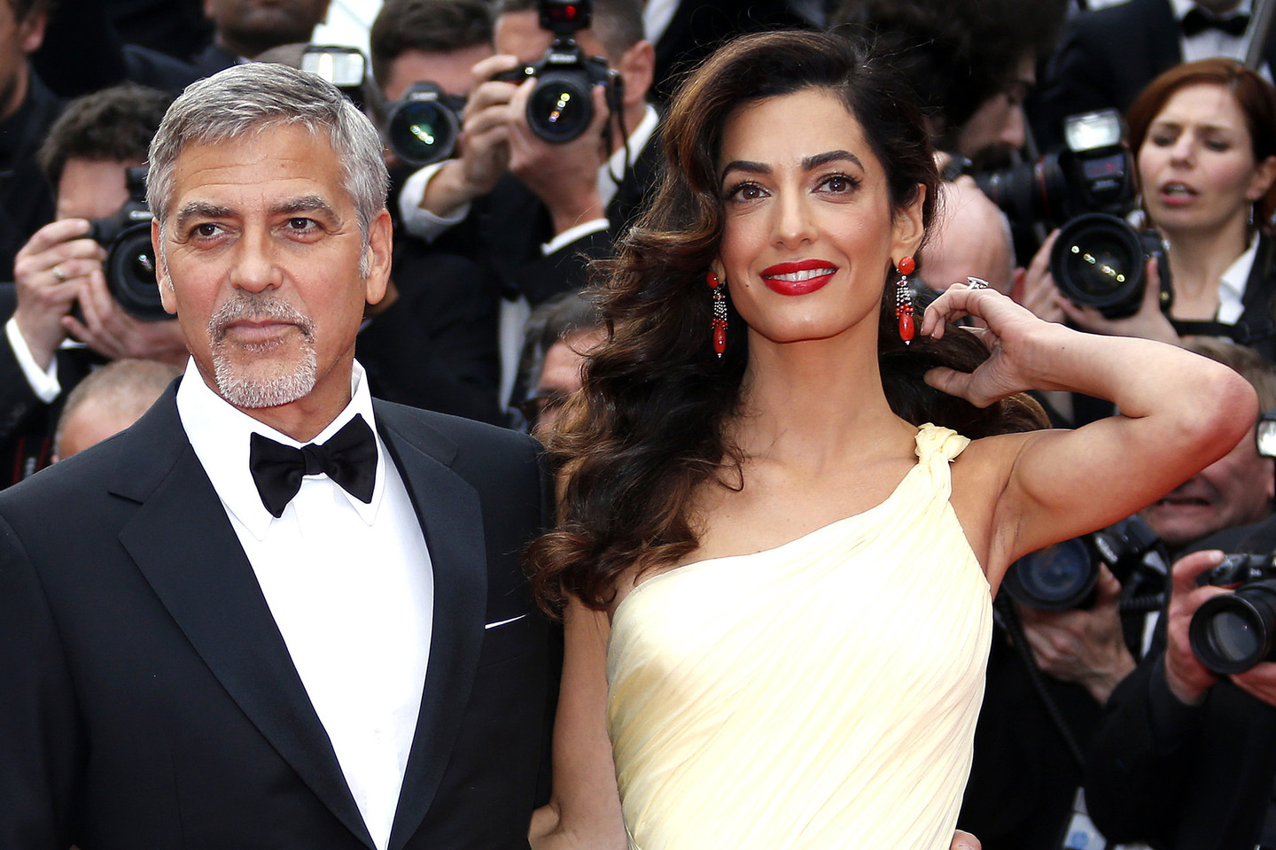 George'ą Clooney į filmo premjerą atlydėjo jo žmona Amal.<br>AP, Scapix ir ViDA Press nuotr.