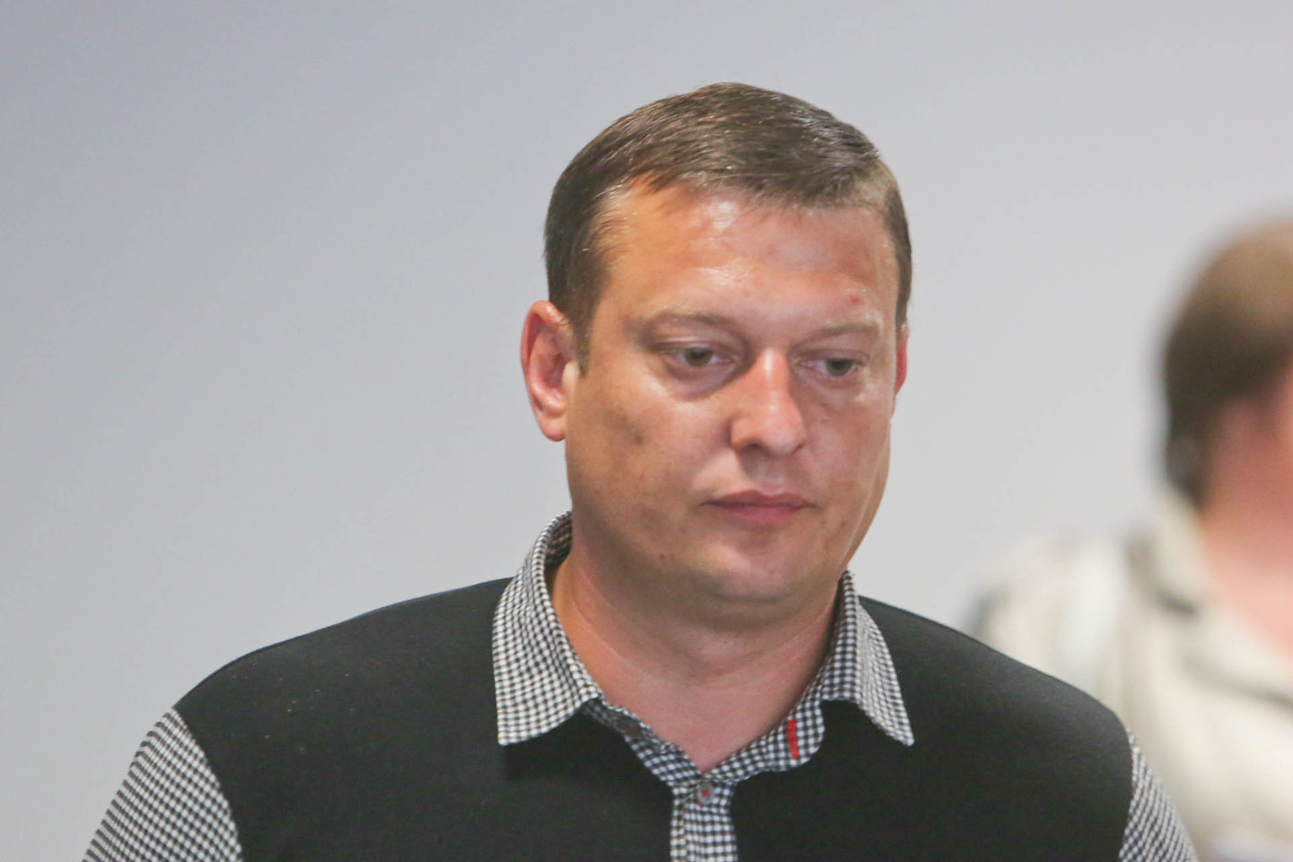 Korupcijos byloje teisiamas Kauno patrulis K.Berūkštis (nuotr.) ir jo kolega G.Vilpišauskas savo kaltę neigia.