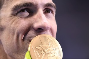 Didingasis Michaelas Phelpsas: laimėjo dar du aukso medalius