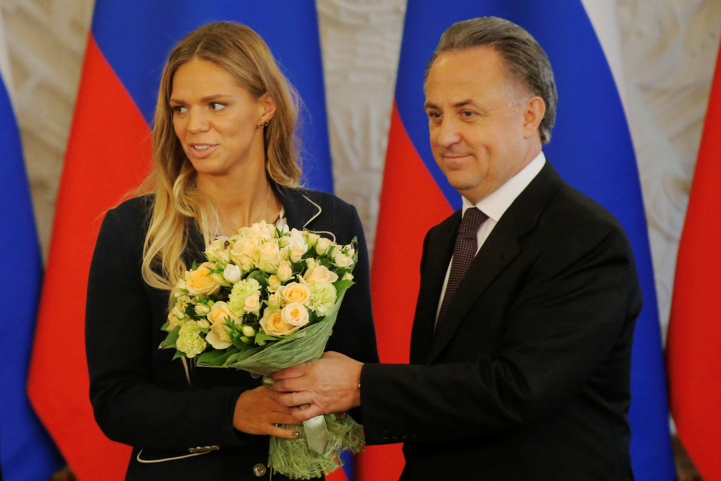 Vitalijus Mutko (dešinėje) siejamas ir su Rusijos dopingo skandalu.