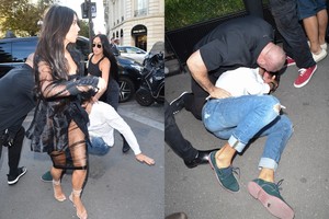 Buvęs ukrainiečių reporteris bandė pabučiuoti Kim Kardashian sėdynę