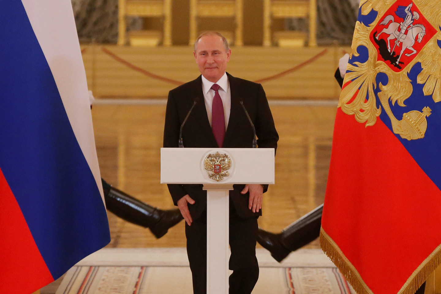 V.Putinas ne kartą siūlymus neįleisti rusų olimpiečių į Rio vadino politiniais žaidimais.<br>Reuters/Scanpix nuotr.