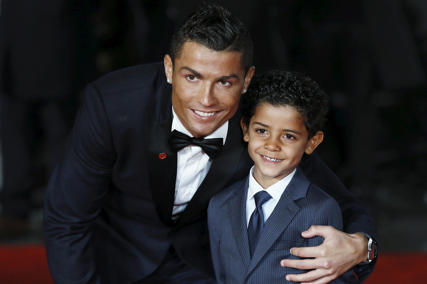 C.Ronaldo su sūnumi.