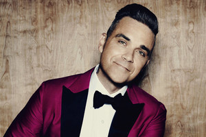 Britų superžvaigždė Robbie Williamsas vėl koncertuos Lietuvoje