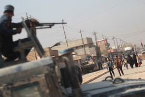 Irako kurdai atakuoja IV laikomą miestą į rytus nuo Mosulo