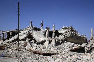 Sirijos armija skelbia visiškai perėmusi Alepo kontrolę