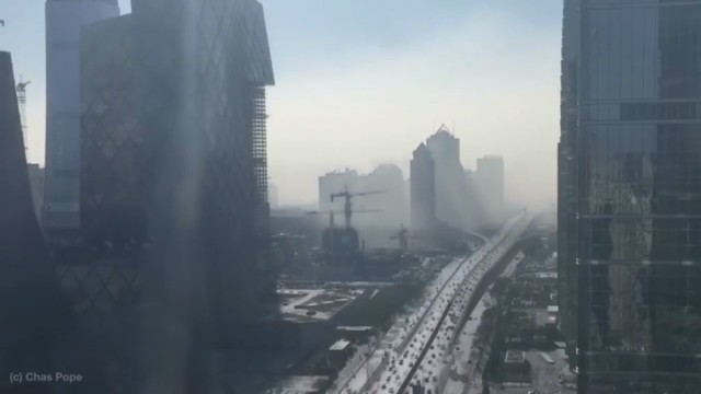 Bauginantys vaizdai: vos per 20 sekundžių didmiestis paskęsta smoge