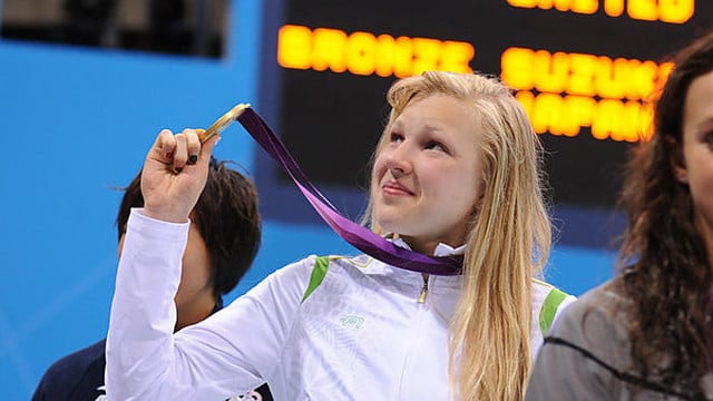 Palangiškiai džiaugsmingais šūkiais pasitiko R. Meilutytės pergalę