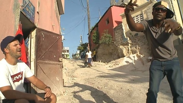 Haičio gyventojai aukoti kviečia repuodami lietuviškai