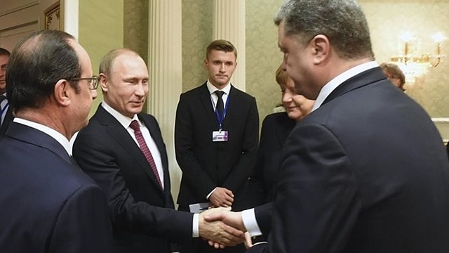 Karštos derybos Minske: V. Putinas apsižodžiavo su P. Porošenka