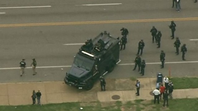 Protestai JAV: policininkai vėl nušovė juodaodį paauglį