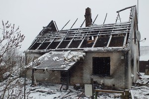 Marijampolės ugniagesiai per naktį gesino užsiliepsnojusį namą