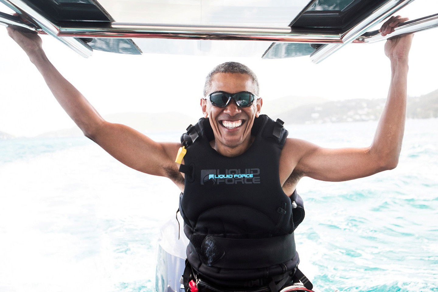 Anot R.Bransono, po kelių dienų treniruočių B.Obama nugalėjo jį vandens sporto rungtynėse.<br>Reuters/Scanpix nuotr.