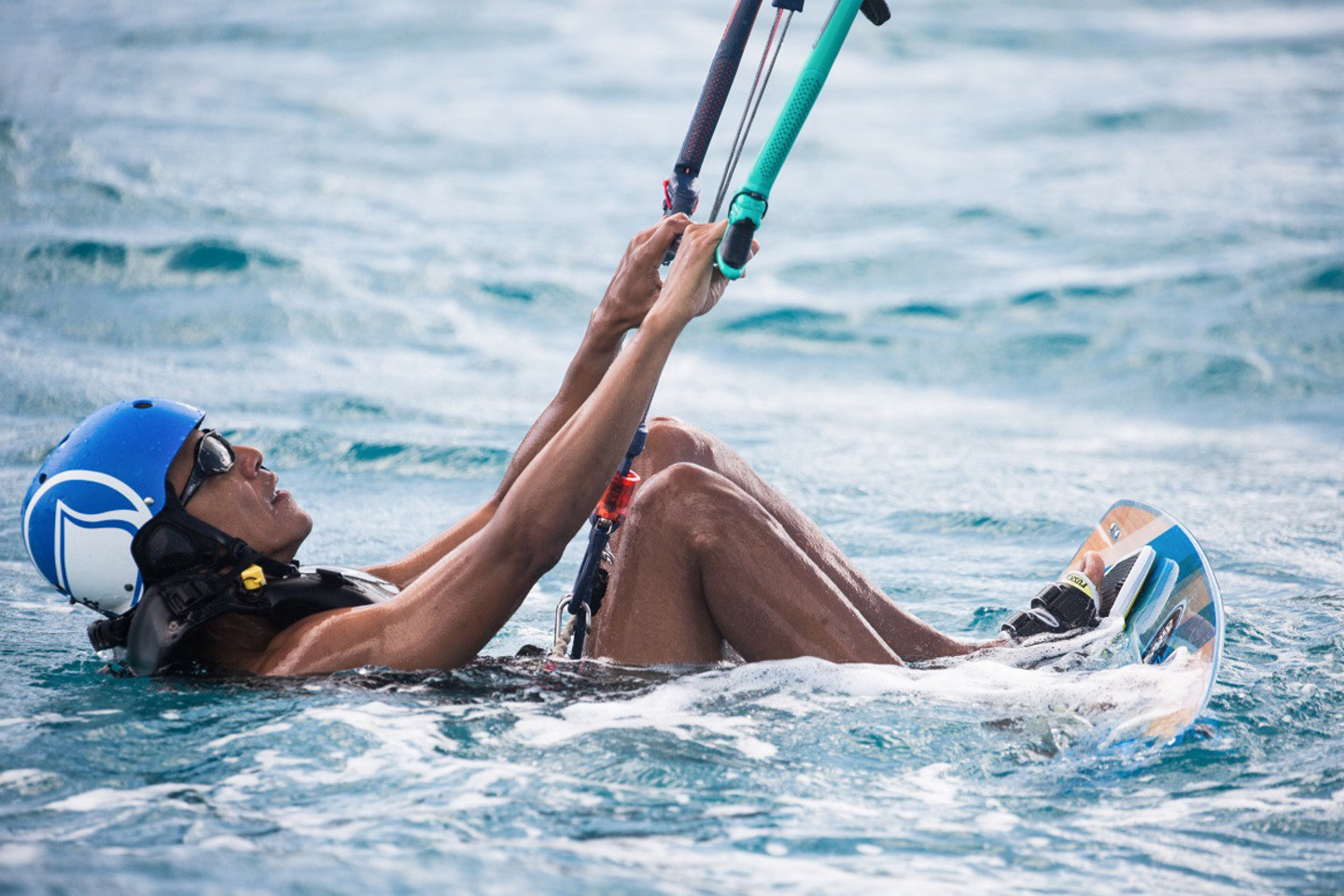 Anot R.Bransono, po kelių dienų treniruočių B.Obama nugalėjo jį vandens sporto rungtynėse.<br>Reuters/Scanpix nuotr.