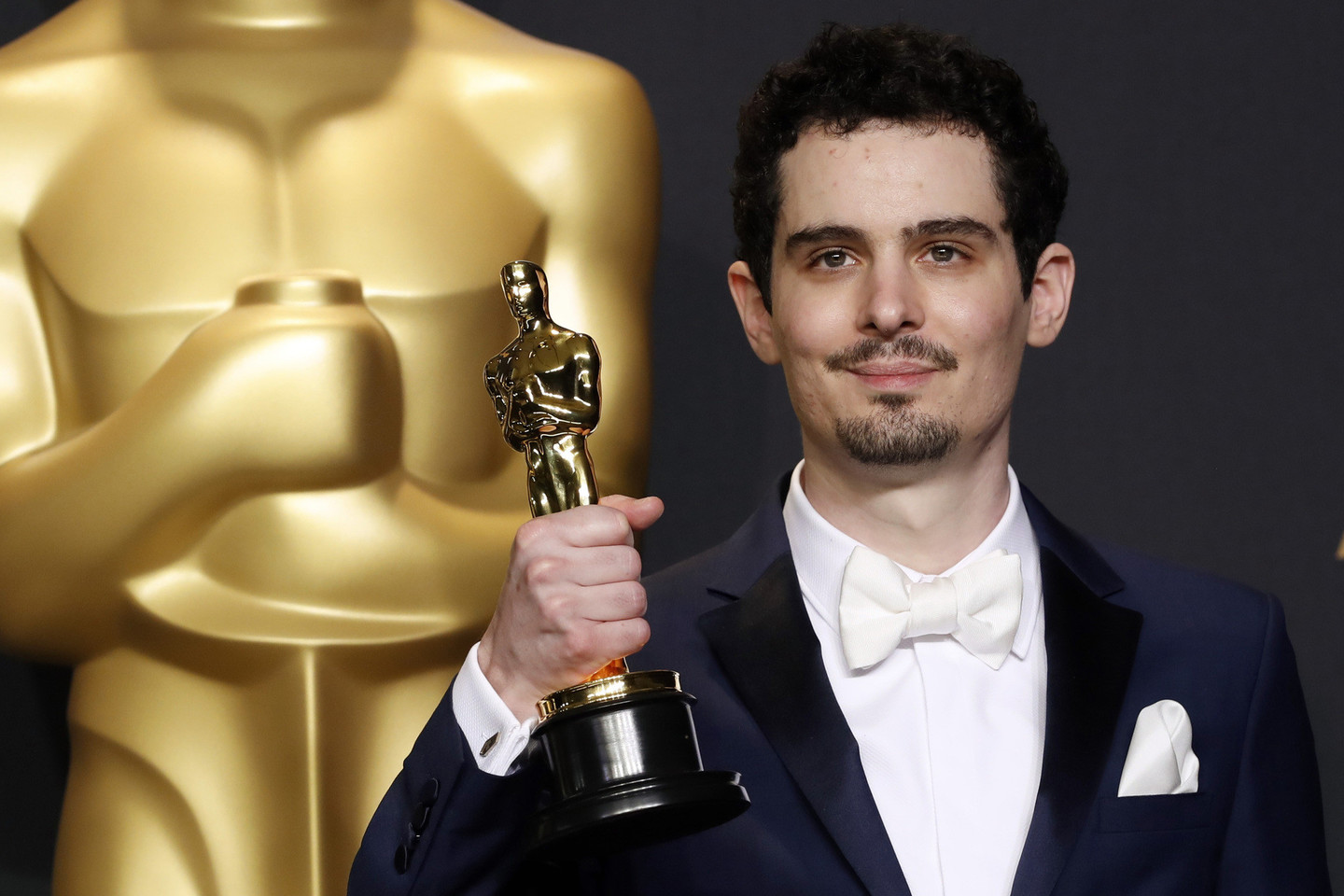 D.Chazelle'ui – „Oskaras“ už geriausią „Kalifornijos svajų“ režisūrą.<br>„Reuters/Scanpix“ nuotr.