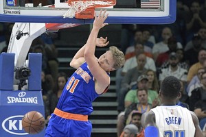 Mindaugas Kuzminskas dar moka skrajoti: į krepšį dėjo efektingai