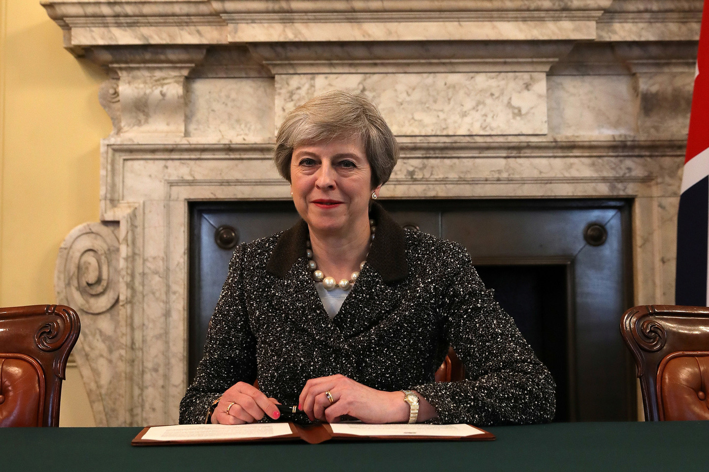 Jungtinės Karalystės premjerė Th.May optimistiškai tiki, kad „Brexit“ derybos vyks sėkmingai.<br>„Reuters“/“Scanpix“ nuotr.