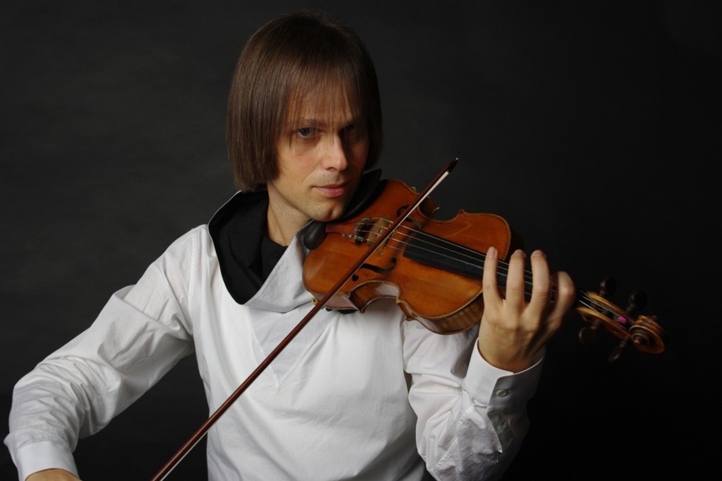 Ukrainoje gimęs smuikininkas Dima Tkačenko.<br>Organizatorių nuotr.
