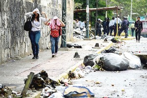 Neramumai Venesueloje: lyderio užmojus pasitiko protestai ir pasipriešinimas