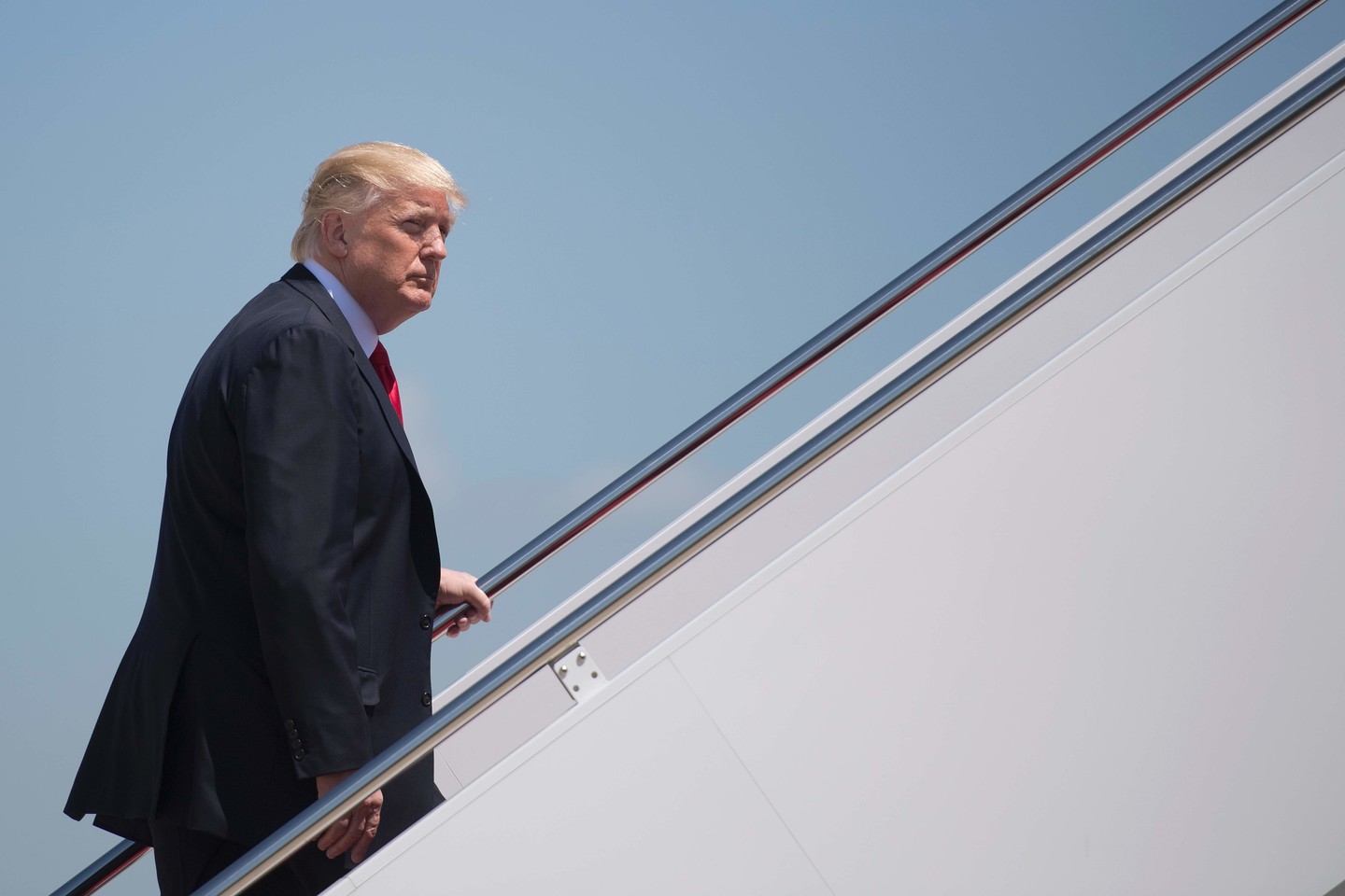 Donaldas Trumpas nuo prezidento inauguracijos sausį nesurengė nė vieno vizito į užsienį. <br> AFP/"Scanpix" nuotr.