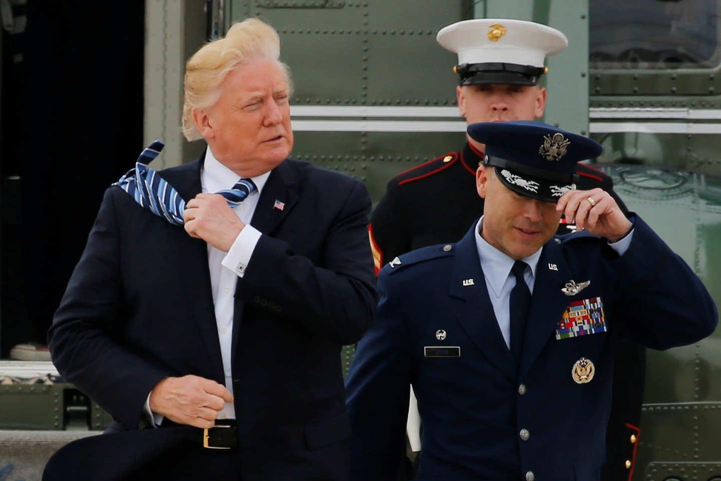  Programišiai aukas viliojo JAV prezidento D. Trumpo vardu.<br> Reuters/Scanpix nuotr.