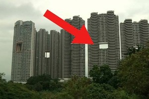 Ką reiškia skylės Kinijos dangoraižiuose? Nė už ką nepatikėsite