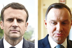 Varšuva įtariai žvelgia į Emmanuelį Macroną