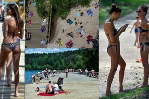 Vilniečiai karštą šeštadienį vėsinosi vis dar šaltuose ežeruose