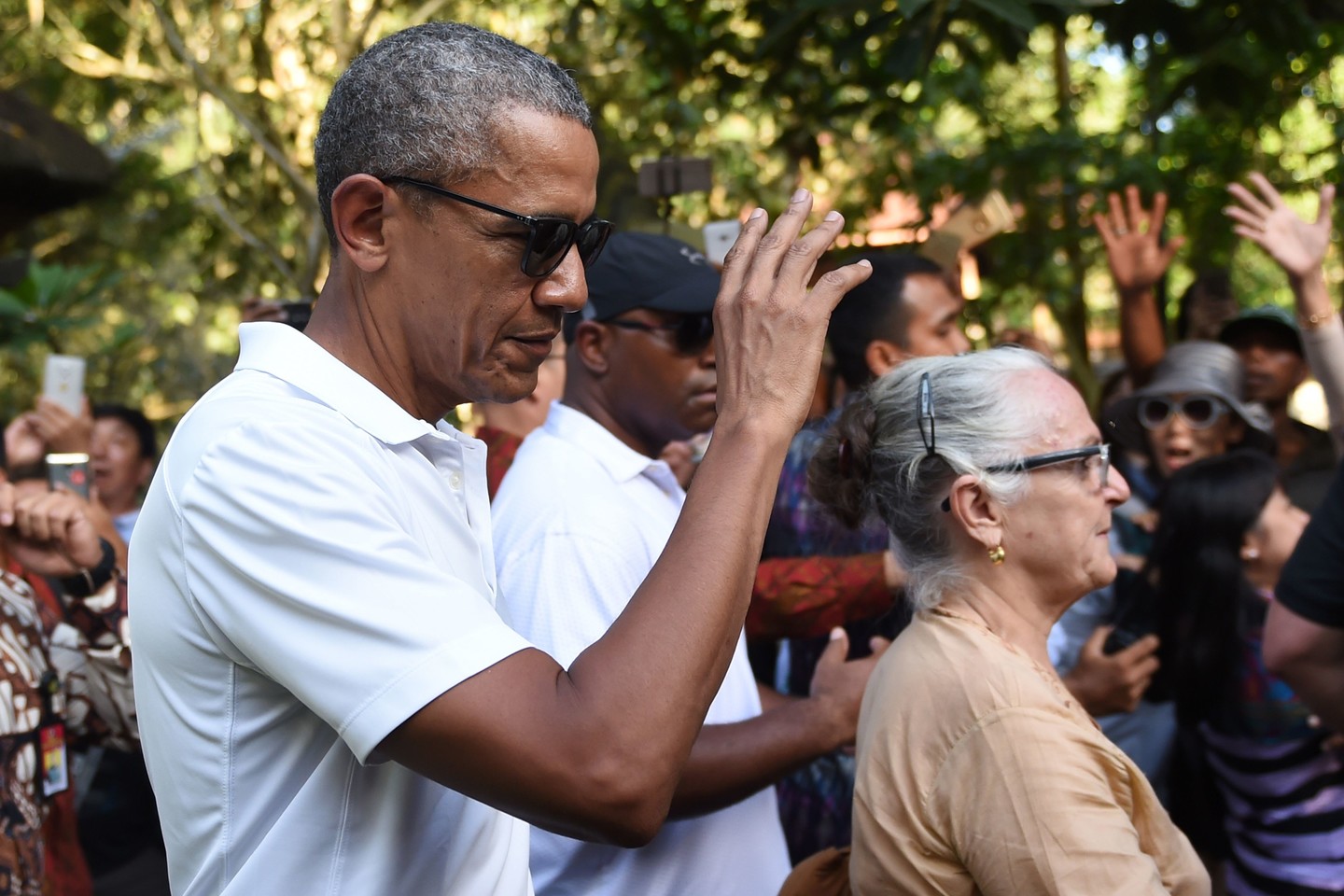  B.Obama su žmona ir dukromis ilsėjosi Indonezijoje. <br> AFP/Scanpix nuotr. 