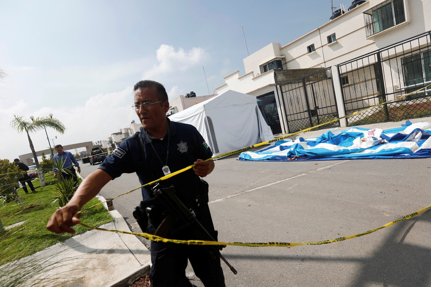 Vidurio Meksikoje užpuolikai įsibrovė į namą, kuriame vyko vakarėlis, ir nužudė 11 žmonių.<br> Reuters/Scanpix nuotr.