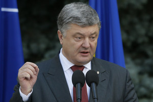 Ukrainos prezidentas reikalauja MH17 lainerio numušimo kaltininkų atsakomybės