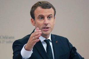 Emmanuelio Macrono planų kurti migrantų centrus Libijoje neįmanoma įgyvendinti