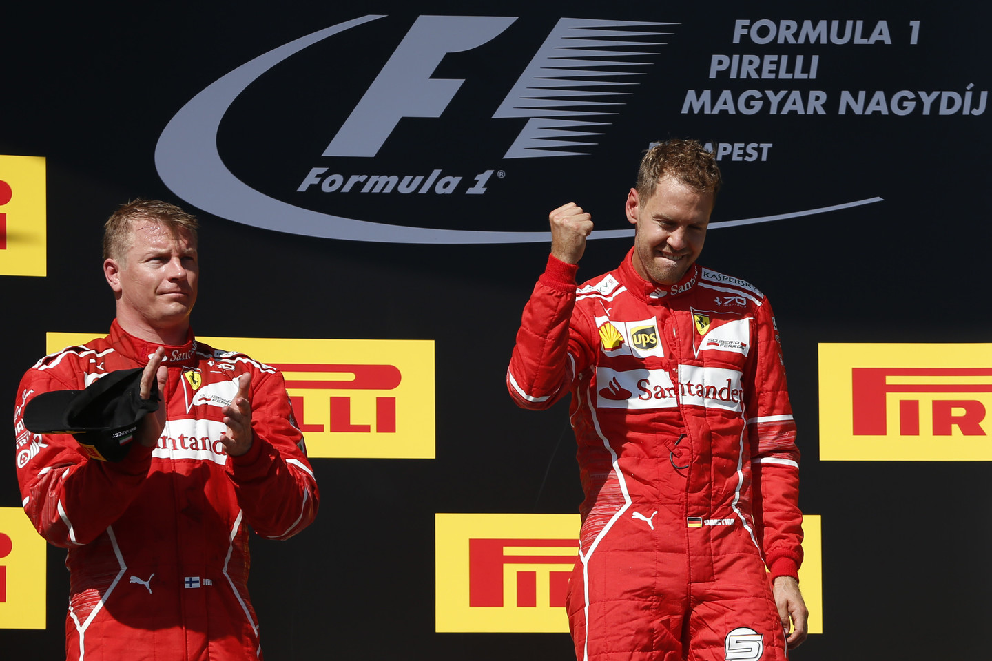  S.Vettelis pelnė pergalę su gendančiu "Ferrari".<br> AP nuotr