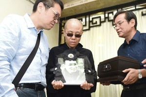 Paslaptingai dingo Kinijos disidento žmona