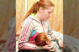 Neįgalios dukros susilaukusiems tėvams – dar vienas antausis iš teismo