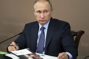 Vladimiras Putinas griebėsi taikos sergėtojo vaidmens