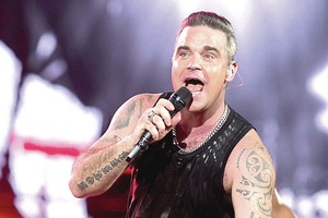 Koncertus Rusijoje atšaukęs Robbie Williamsas: „Šis darbas mane nužudys"