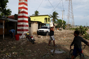 Uraganas „Irma“ nusinešė mažiausiai 17 gyvybių, gatvėse siautėja plėšikai