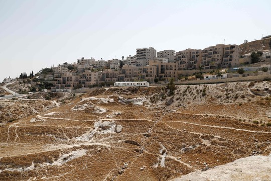 Izraelis ignoruoja JT reikalavimą sustabdyti nausėdijų statybas