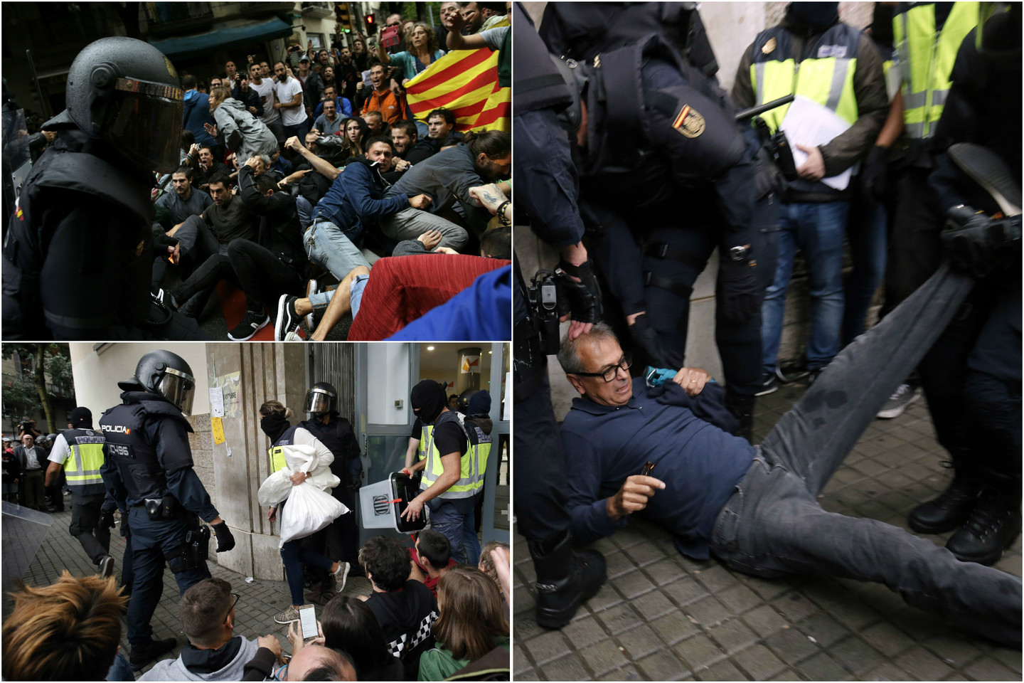  Katalonijoje riaušių policija atiminėja balsadėžes, o į kai kurias apylinkes laužėsi ir daužydama stiklą. <br> AFP/Scanpix nuotr. 