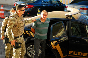 Dešimtmečius ieškotą komunistą išdavė pilnos kišenės pinigų