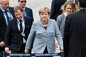 Angela Merkel tikisi konstitucinių Katalonijos krizės sprendimų