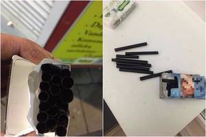 Kauniečio pirkto cigarečių pakelio viduje – nepaaiškinamas radinys