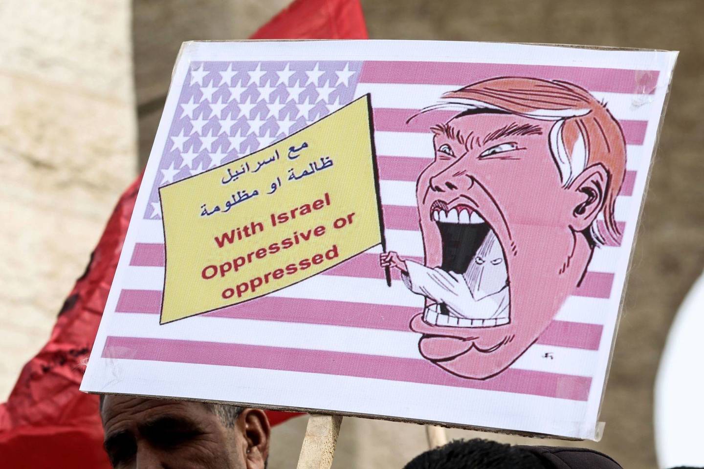 Palestiniečiai protestuoja prieš D.Trumpo planus perkelti JAV ambasadą į Jeruzalę.<br>AFP/“Scanpix“ nuotr.