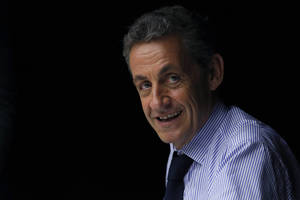 Londone suimtas Nicolas Sarkozy patikėtinis