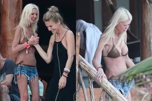 43 kg sverianti Tara Reid paplūdimyje pabrėžė savo šokiruojantį lieknumą 